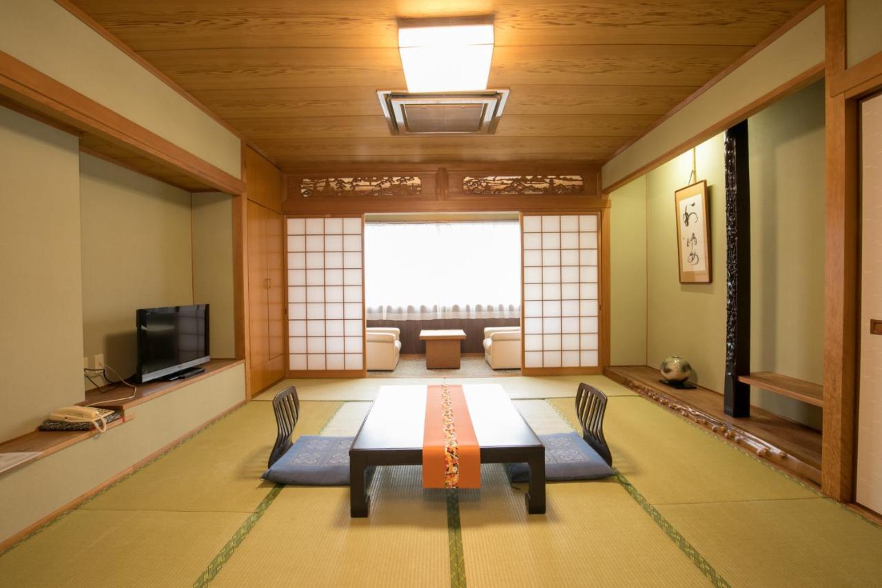 Hotel Takasago Kōchi Rum bild